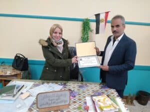شهادة شكر وتقدير من مدرسة عزبة الباجور للتعليم الأساسي للدكتورة أمنية فاروق
